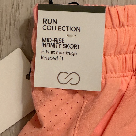 NWT CALIA INFINITY RUN COLLECTION SKORT SKIRT RELAXED FIT MID RISE PEACH GLOW L - Picture 9 of 10